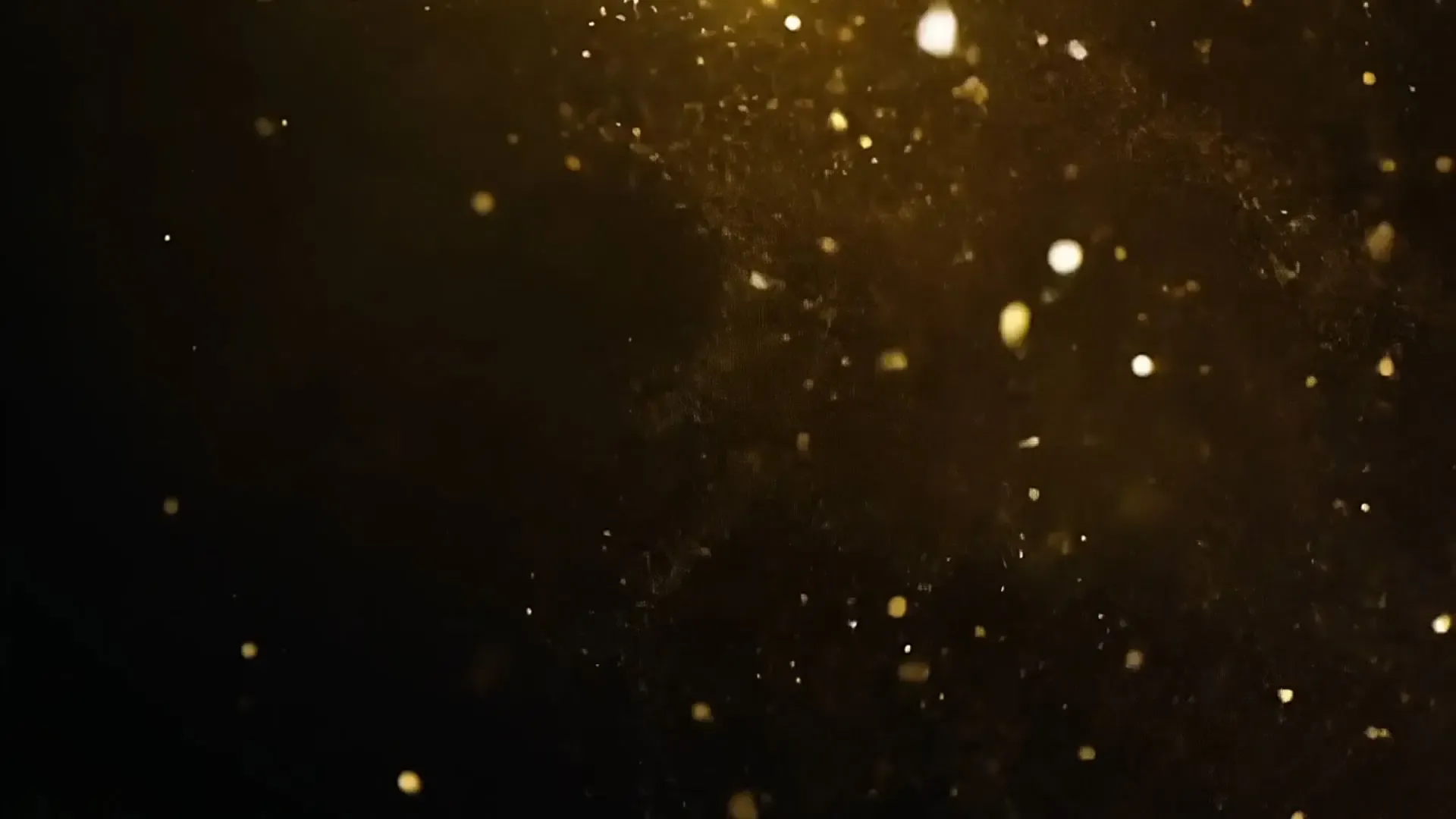 Shimmering Gold Particles Overlay for Festive and Luxury Projects